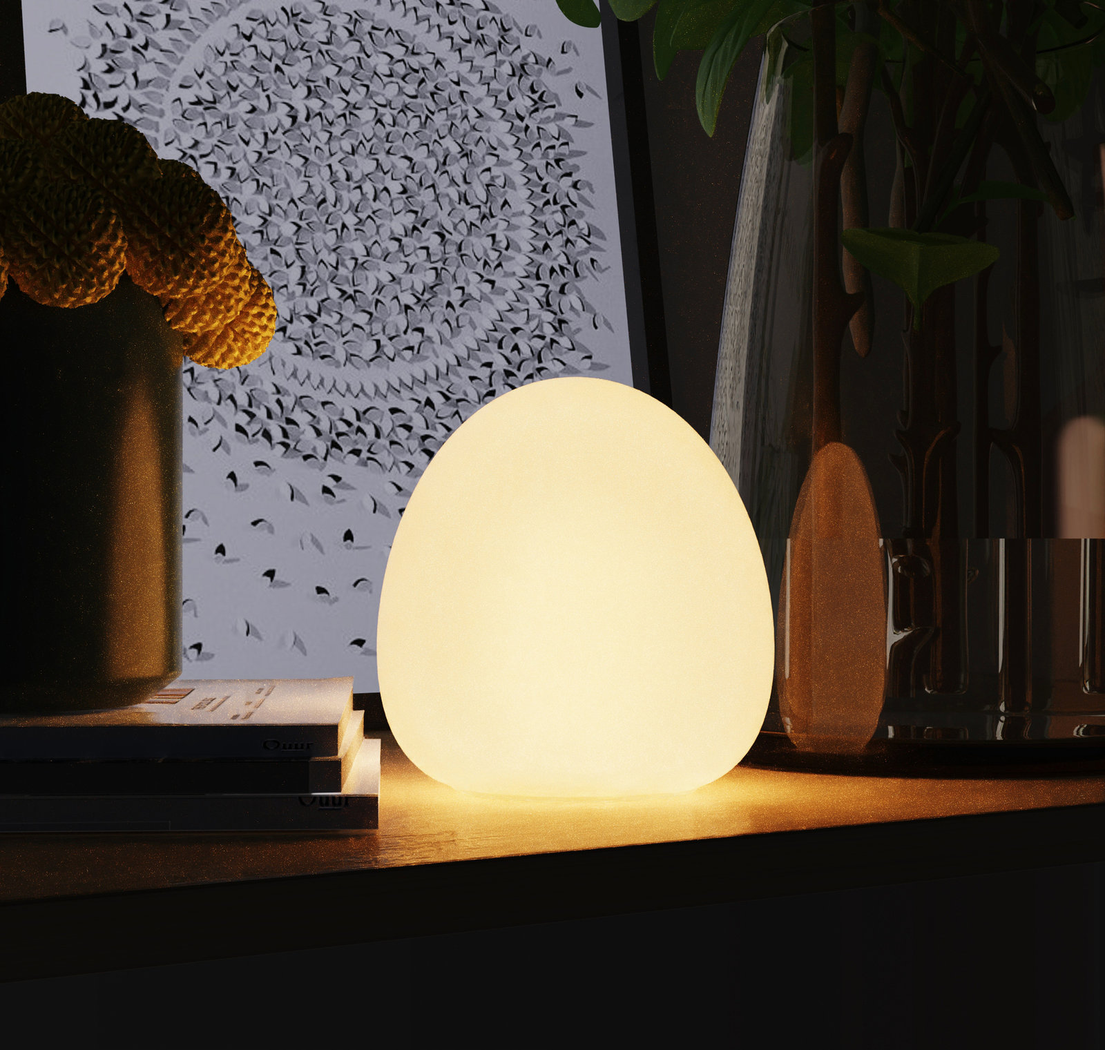 Rechargeable accent lamp lit on a console table, warm light in a dark room